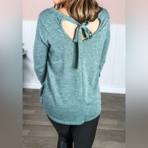 Sew in love sweater worn once key hole tie in back, size large